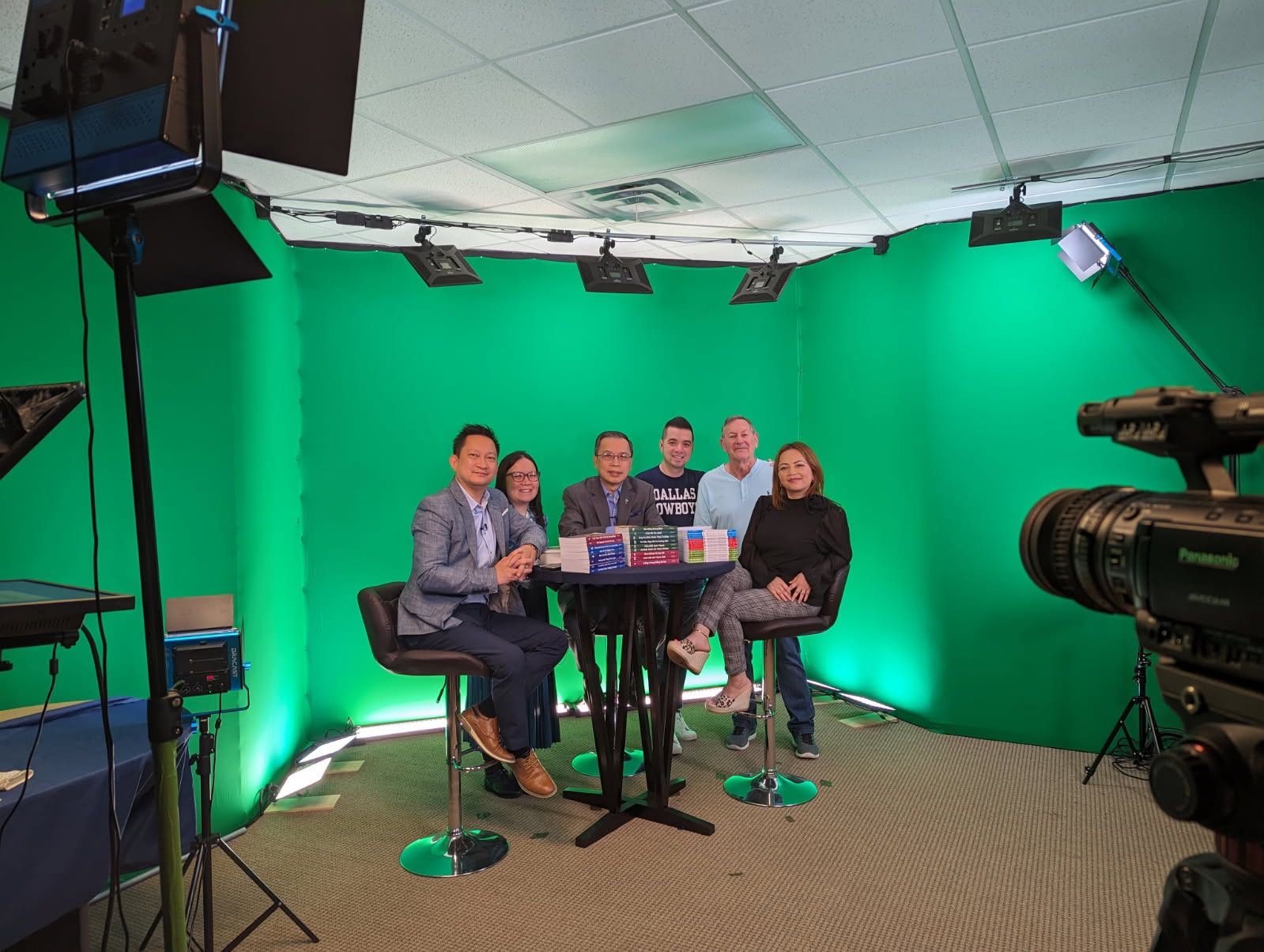 Podcast host and production team serving through media ministry